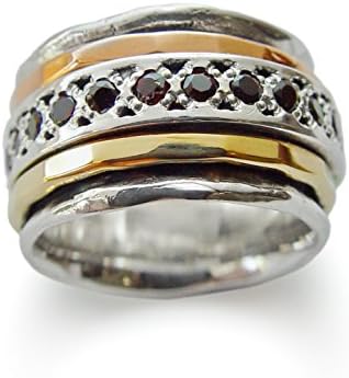 Two tone rustic spinner ring with Red Garnet