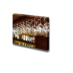 Empty Glasses for Wine Above a Bar Rack
