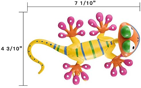 Colorful gecko metal wall art decor on a sunny day in a garden fence.