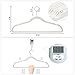 SONGMICS Hangers 50 Pack, Velvet Non Slip, 0.18 lb per Hanger, Durable, 0.2 Inch Thickness Space Saving, 360° Swivel Hooks, Beige UCRF50L