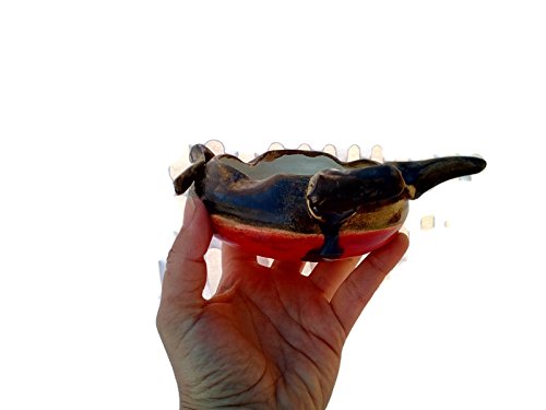 Animal-like hand thrown ashtray red and brown, with tail and horns