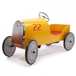 red and yellow plastic pedal car