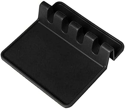 cucchiaio rustico di riposo per il piano della stufa