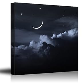 Crescent Moon and Stars Above Dark Clouds