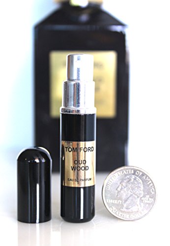 TOM FORD PERFUMES. UNISEX. MINI ATOMIZER SIZE 4ml. (OUD WOOD) by Tom Ford