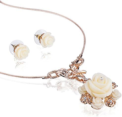 The Elizabethan Mother of Pearl Rose Pendant Necklace in Swarovski Crystal. Two Piece Jewellery Set with Matching Beautiful Cream Rose Earrings. Part of The Elizabeth Collection from Janeo. Delicate Petals and Roses withCrystal Centres, FineRope Necklace, All on an Exquisite Rose Gold Setting. Incredible, Fine Detailing.The Perfect Anniversary or Christmas Present