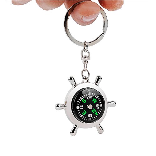 Metallic Silver magnetic wheel compass key chain , flexible design make compatible for every travel accessories and helps to navigate the right track in your exploratory trips