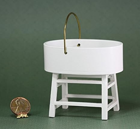 white wooden bassinet