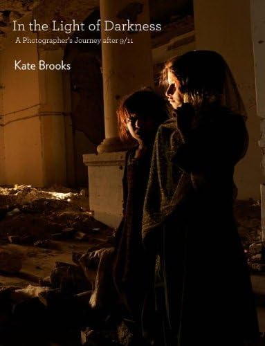 Kate Brooks: In the Light Of Darkness: A Photographer's Journey After 9/11 Hardcover – 19 Sep 2011