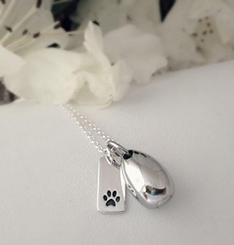 A Sterling Silver Memorial Necklace with Discreet Stainless Steel Teardrop Cremation Urn Pendant and Sterling Silver Paw Print charm Remembrance Bereavement Jewelry