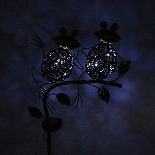 Solar backyard light shining brightly during the night hours.