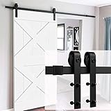 Sliding barn door floor guide