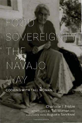 The cover of Food Sovereignty the Navajo Way: Cooking with Tall Woman. Behind the title is a black and white image of an indigenous elder. 