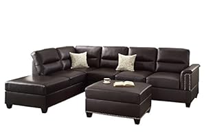 Black sectional with matching ottoman in the middle