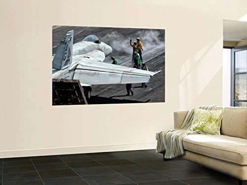 Flight Deck Crew Position an F/A-18E Super Hornet into Launch Position Aboard Uss Eisenhower Wall Mural by Stocktrek Images 48 x 72in