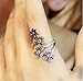 CHOP MALL® Fashion Retro Four Small Plum Cute Flower Ring +yellow rubber band