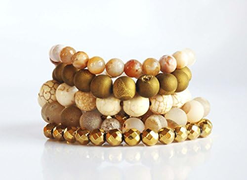 The Golden Goddess Set is a combination of 5 elastic gemstone bracelets .
