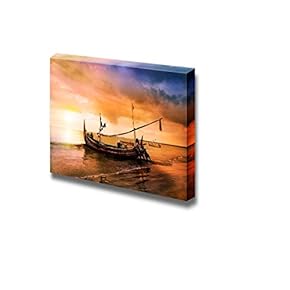 Sailboat Being Pushed into Water at Sunset Wall Decor