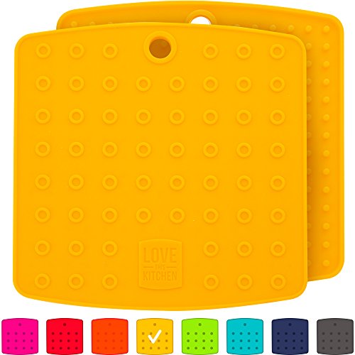 Premium Silicone Trivet Mats / Hot Pads, Pot Holders, Spoon Rest, Jar
Opener & Coasters - Our 5 in 1 Kitchen Tool is Heat Resistant to 442
°F, Thick & Flexible (7" x 7", Mustard Yellow, Set of 2)