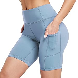 Ogeenier Vrouwen 8 inch Yoga Running Shorts met zakken Tummy Control Workout Fietsen Gym Shorts