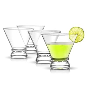 Cocktail glasses with lime garnish