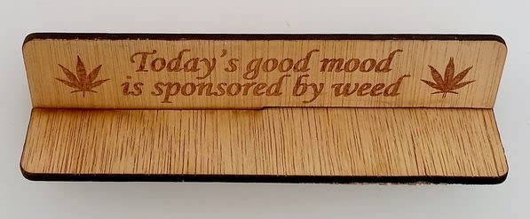 Laser Wales Made Wooden rolling up stand with slogan on 'Today's good mood is sponsored by weed'
