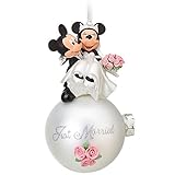 Just Married Here comes the bride and groom! The perfect keepsake, our wedding Mickey and Minnie ornament is decorated with sculpted roses ornament- gorgeous