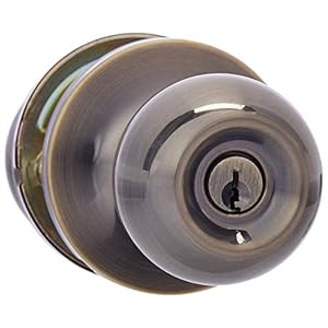 Amazon Basics Exterior Door Knob With Lock, Standard Ball, Antique Brass