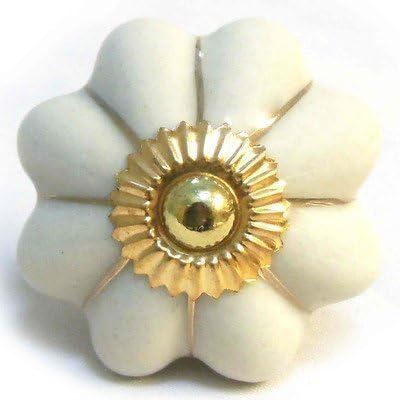 Pushka Home Cream Gold Striped Mushroom Porcelain Ceramic Cupboard Door Knob Handle Pull. Sold individually. Features a distinctive mushroom flower type design with gold stripes and brass metal fixings. 40mm decorative handle suits furniture doors for kitchen cabinets, drawers, wardrobes, cupboards or dressers. Supplied with a standard screw, two nuts and one washer. Screw suits door thickness up to 27mm. Vintage cream and gold door knob is ideal for rooms with gold accents.