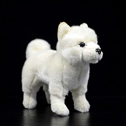 peluche perro blanco y negro