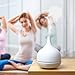 AUKEY Essential Oil Diffuser, 500ml Aroma Humidifier with 4 Timer Settings, Mist Modes and 7 Color Changing LED Lights