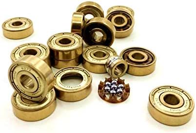 Gold seal with 7mm diameter interior made of materials resembling gold balls.