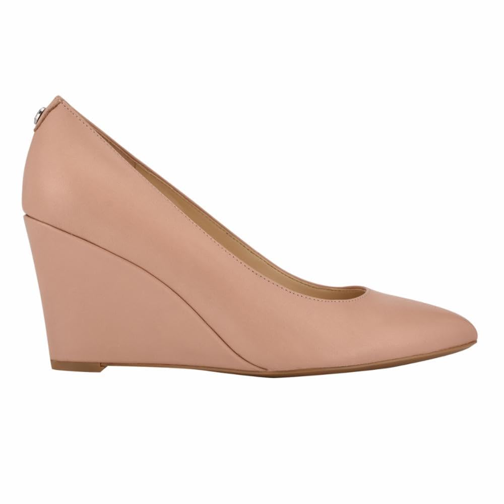 Photo 1 of Nine West Women's Cal9X9 Wedge Pump, Barely Nude 110, 9.5