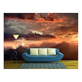 BRAND_NAMEFiery Sunset Over The Mountain Peaks with Dramatic Cloud Formation