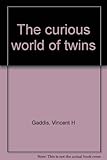 Paperback The curious world of twins Book