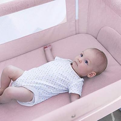 pink bedside bassinet