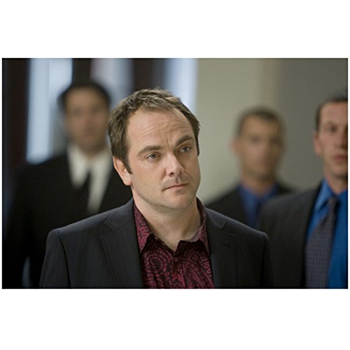Leverage Mark Sheppard in front of several men in suits 8 x 10 Inch Photo