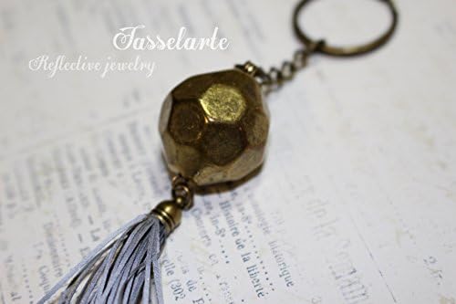 Reflective purse charm with tassel, life saving handmade pendant charm to a purse, coat, backbag, zipper pull.