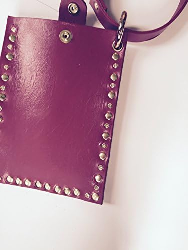 Cell phone case/wallet in fuscia with swarovski crystal rivets