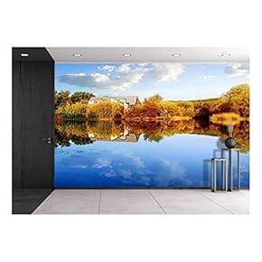 House in Autumn Forest Near Calm River - Removable Wall Mural | Self-Adhesive Large Wallpaper - 66x96 inches