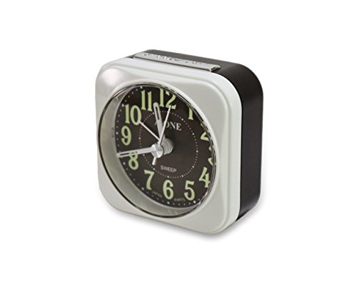 Traveler Mini Alarm Clock, Quartz Movement, Simple Modern Design, 2.5" in Diameter. Mute (Non-Ticking) Clock Hands. Built-in Light Bulb