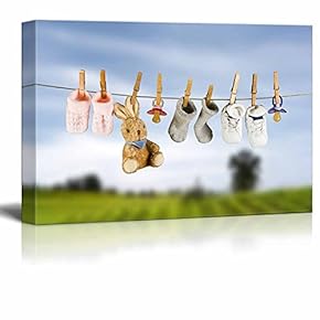 Toy Rabbit and Pacifiers Hanging on a Clothesline for a Baby Nursery - Canvas Art Wall Art - 12" x 18"