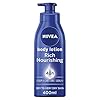 NIVEA Rich Nourishing Body Lotion (400ml), NIVEA Moisturiser for Dry Skin Made with Deep Moisture Serum, Natural Almond…