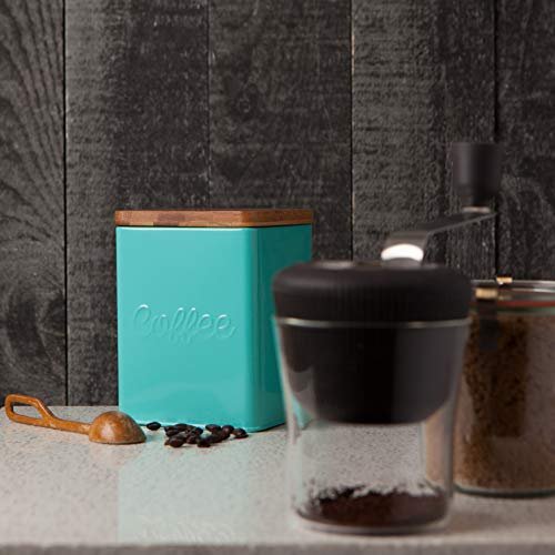 The sleek and contemporary design of the Now Designs Square Coffee Tin complements any kitchen decor or coffee bar. Its glossy finish and minimalist style make it a visually appealing addition to your countertop. Keeping your convenience in mind, the front of the tin proudly displays a bold coffee label, making it effortlessly recognizable amongst other containers and ensuring quick access to your coffee fix.