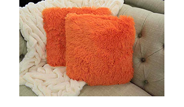 orange furry pillow