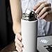 Stainless Steel Water Bottle Tumblers: BPA Free, Vacuum Insulated Travel Mug with Lid and Removable Fruit and Tea Filter for Hot or Cold Beverages - 17 oz. Infuser Bottles Set of 2 (black and blue)