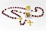Virgin Mary Rosary Beads with a Bottle of BLESSED
