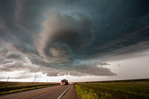 Rotating thunderstorm above semi truck on a Montana highway print picture photo photograph fine art