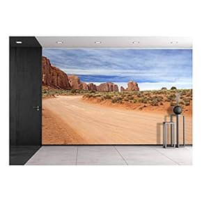 Scenic and Empty Dirt Road in Monument Valley - Removable Wall Mural | Self-Adhesive Large Wallpaper - 66x96 inches
