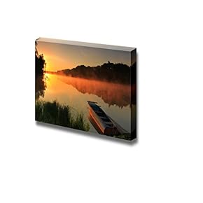 Boat on The Shore of a Misty Lake...